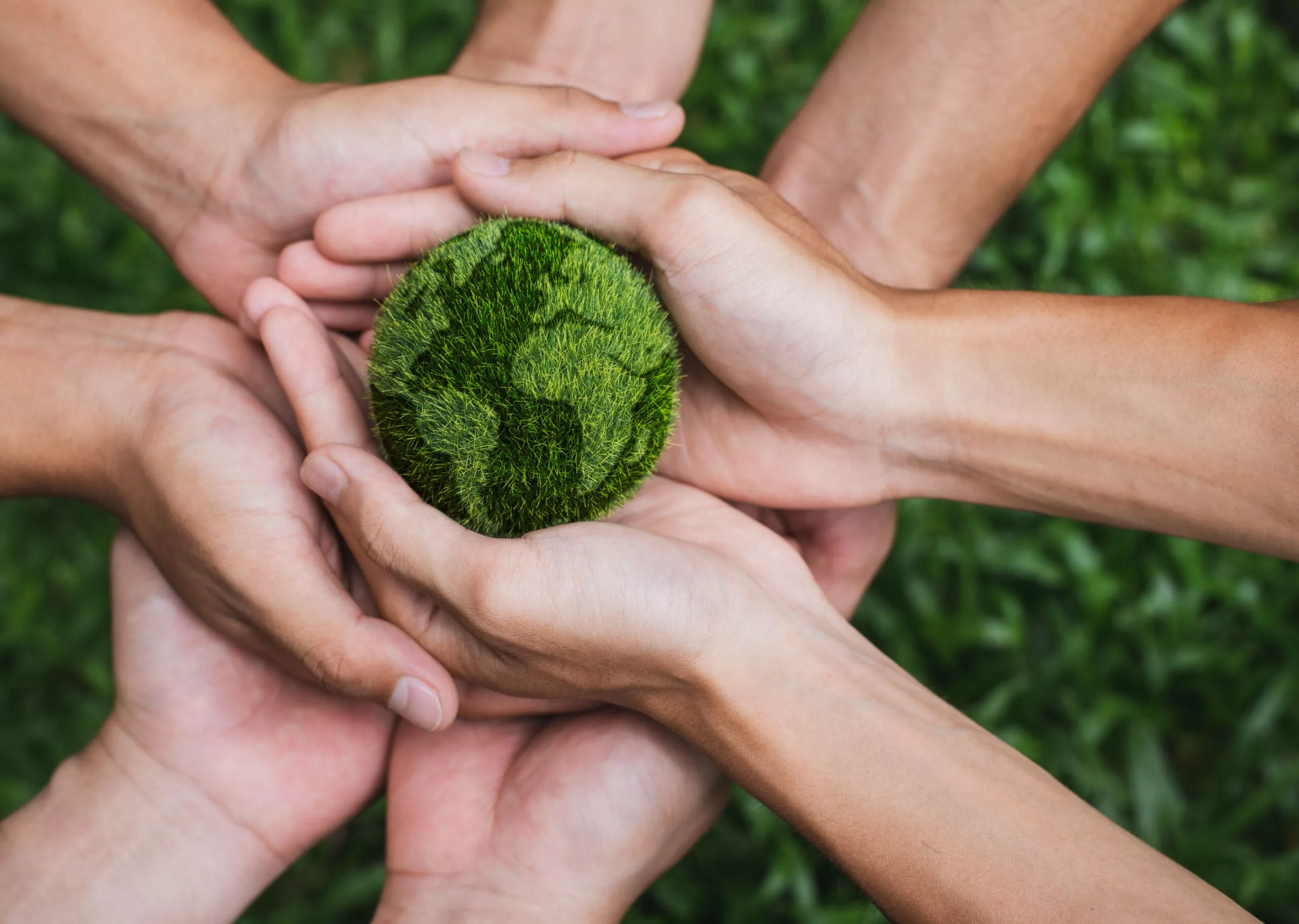 Earth Day. Hands adult Teamwork harmony Holding earth on hands. Environmental and reduce global warming help earth, top view. ecology and environment sustainable concept.